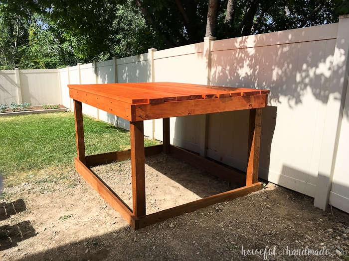 Even though our yard is small, we decided we still needed a DIY playhouse. Check out how we built the small playhouse for our kids, on a budget, starting with the deck. This project was so easy and now we can see the playhouse starting to take shape. Housefulofhandmade.com 